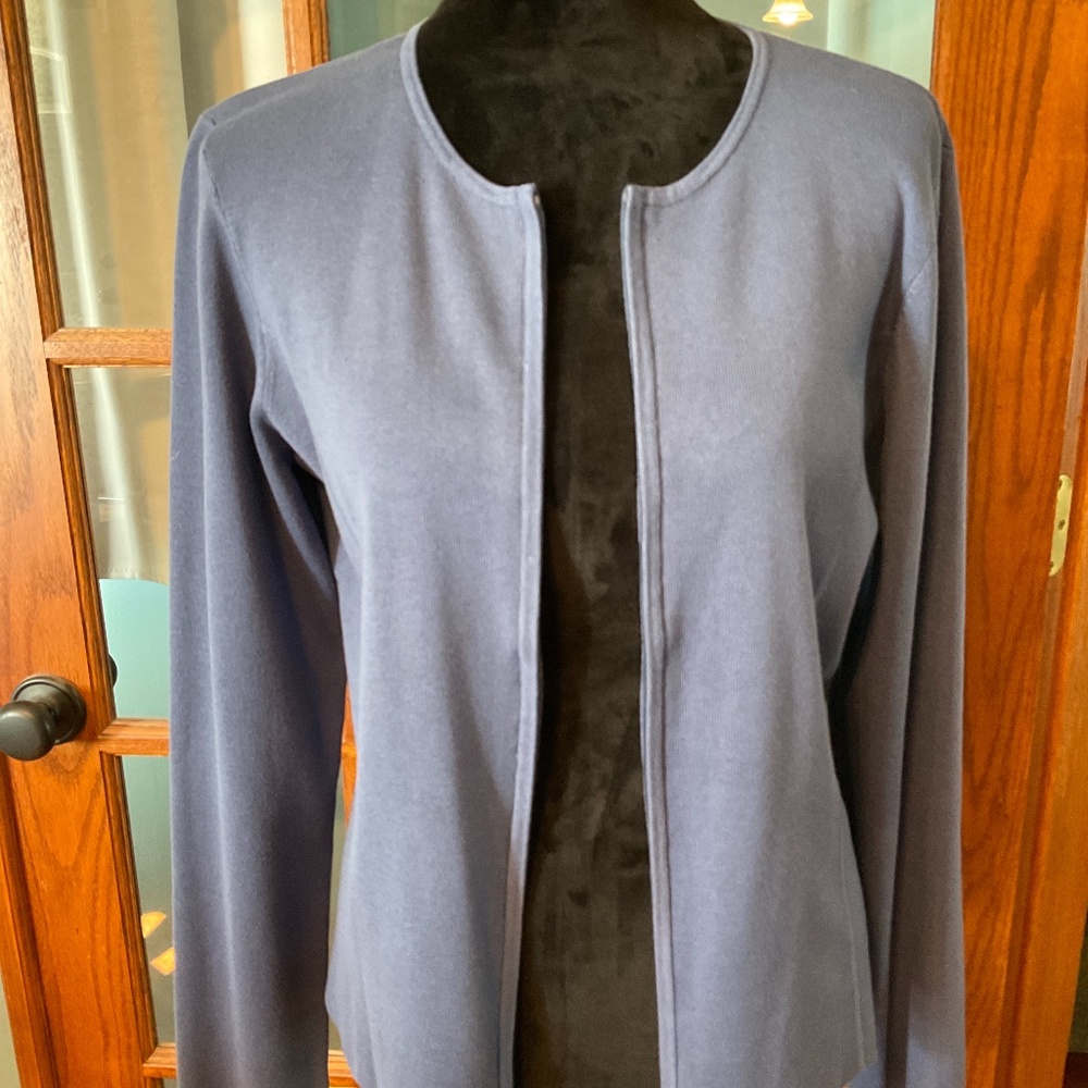 Long sleeve zip up sweater.